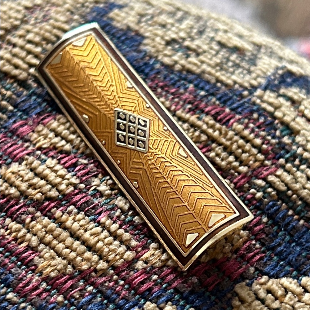 Duri Gold Tone bar.  brooch enamel signed  2x1/2.  pin replaced. as is B4